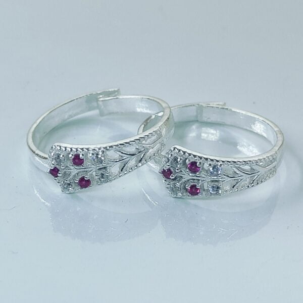 Band Shaped Toe Ring With Pink And White Zirconia Stone In Silver