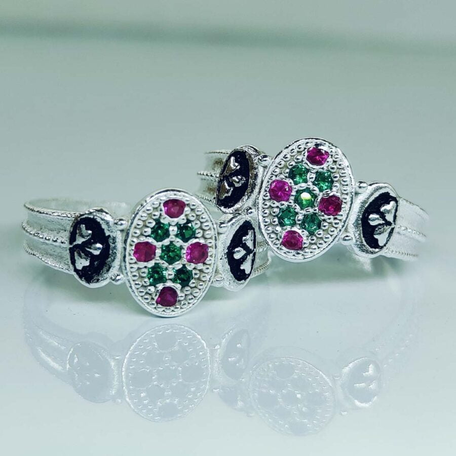 Rakhi Oval Shaped Toe Ring With Pink And Green Zirconia Stones In Silver