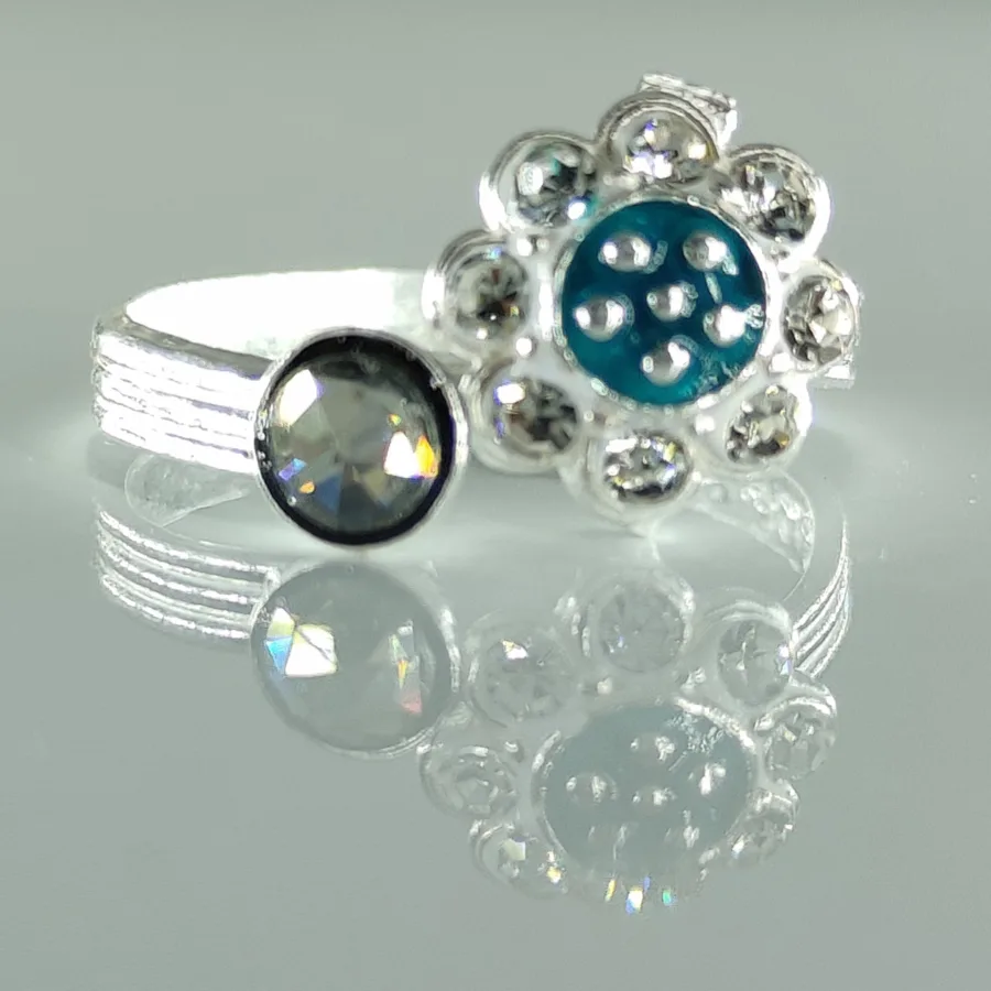 Front Lock Toe Ring With Sky Blue Meena And White Zirconia Stones Arranged In Flower Shape