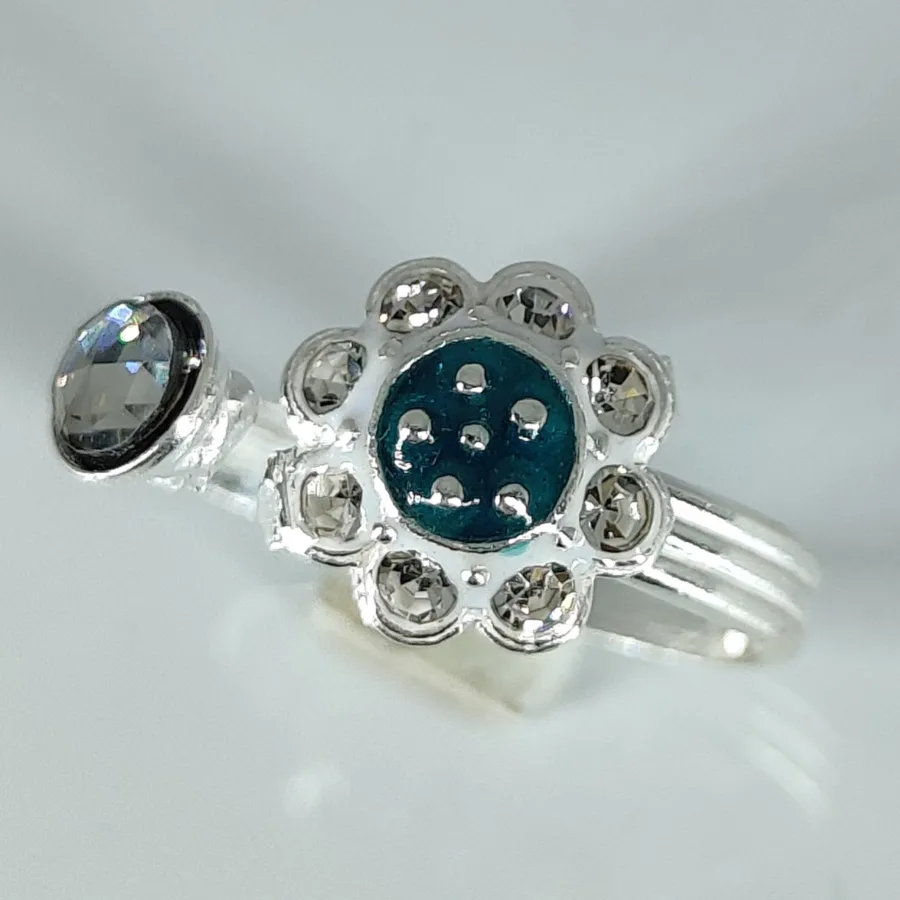 Front Lock Toe Ring With Sky Blue Meena And White Zirconia Stones Arranged In Flower Shape